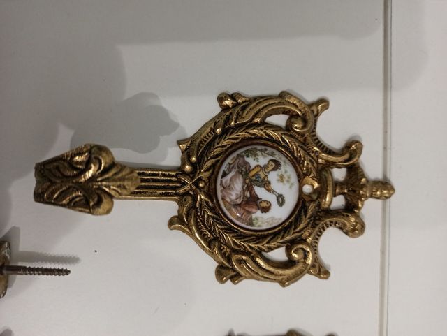 juego de percheros de bronce