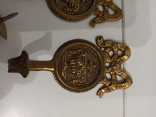 juego de percheros de bronce