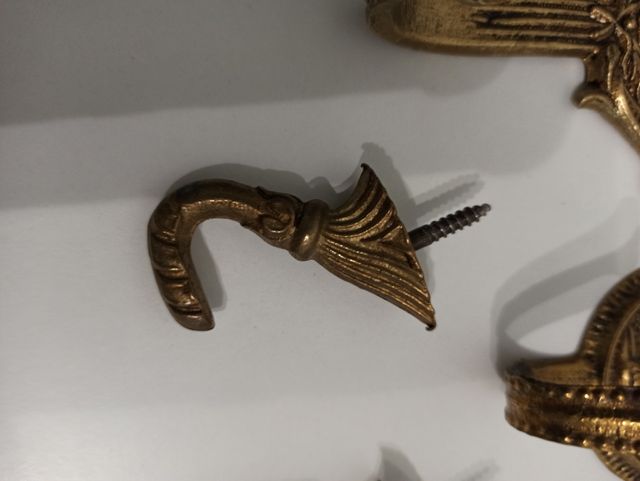 juego de percheros de bronce