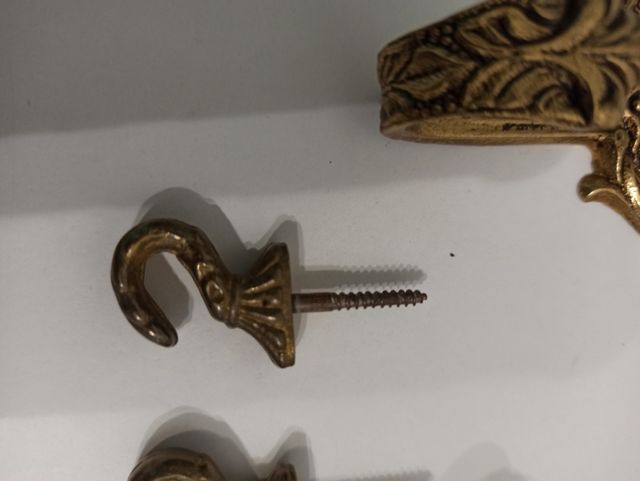 juego de percheros de bronce