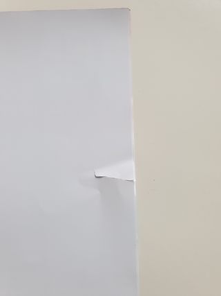 Póster 1m x 70cm. Lateral roto en transporte