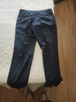 traje de chaqueta azul oscuro