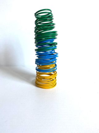 Portabicchieri colorati di metallo