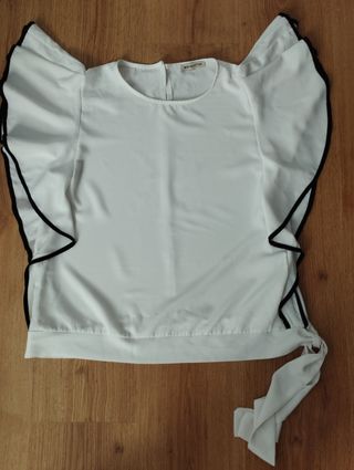 Blusa con volantes