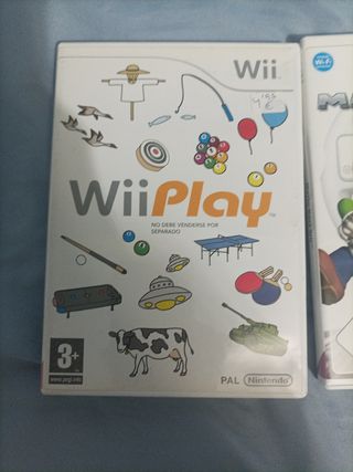 3 juegos de la wii y volantes para Mario kart