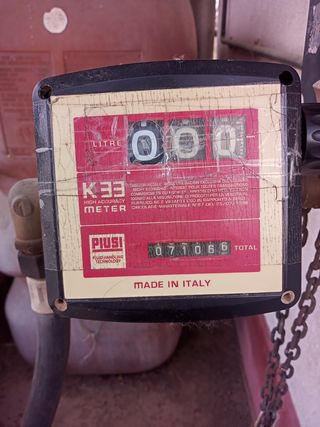 Bomba de gasoil con manguer y depósito