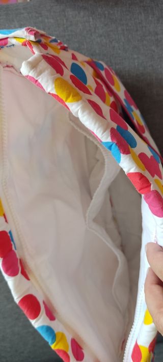 Funda de silla de paseo y bolso.