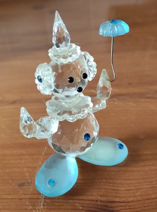 due oggetti in vetro un clawn e due cigni