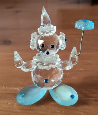 due oggetti in vetro un clawn e due cigni