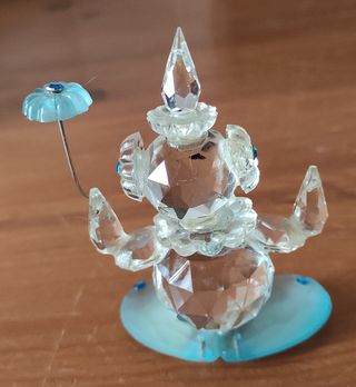 due oggetti in vetro un clawn e due cigni