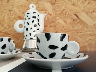 Juego 11 pocillos y cafetera Animal print vaca