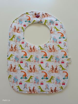 babero animales sobre ruedas