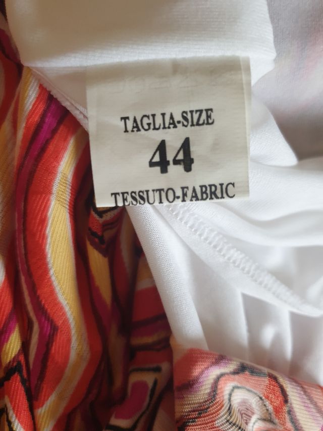 Vestitino a fascia con laccetti. Made in Italy