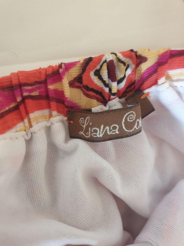 Vestitino a fascia con laccetti. Made in Italy