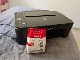 impresora canon con tinta negra de regalo . TS3150