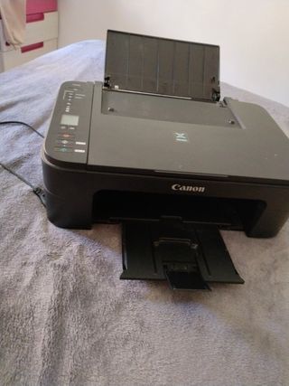 impresora canon con tinta negra de regalo . TS3150