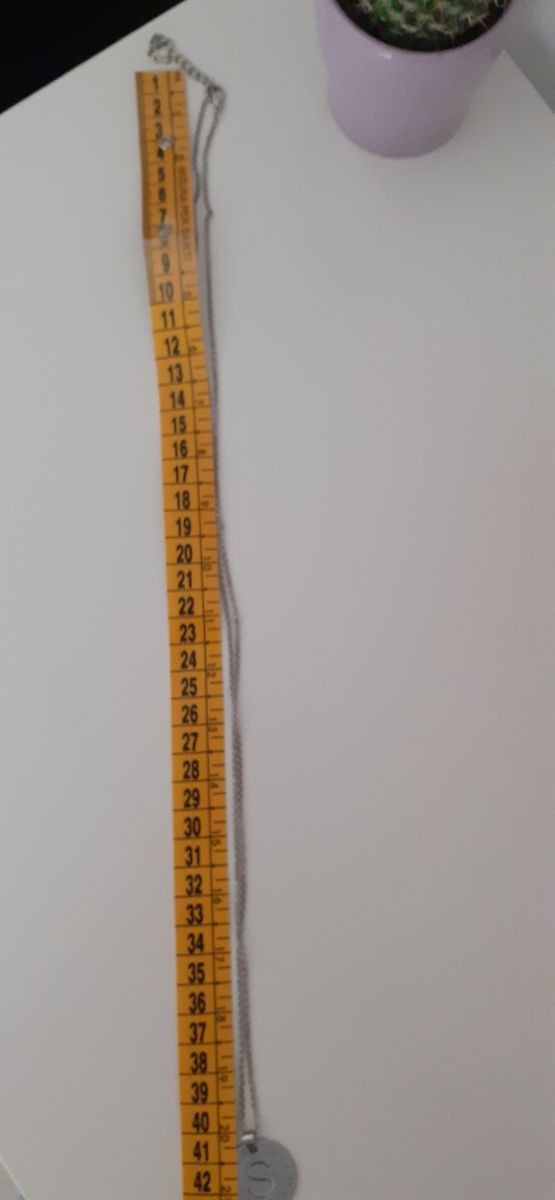 Collana con pendente lettera