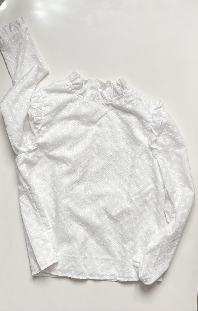 Camicia bianca floreale con volant