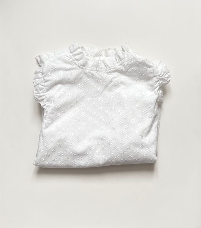 Camicia bianca floreale con volant