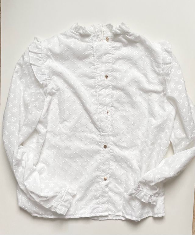 Camicia bianca floreale con volant