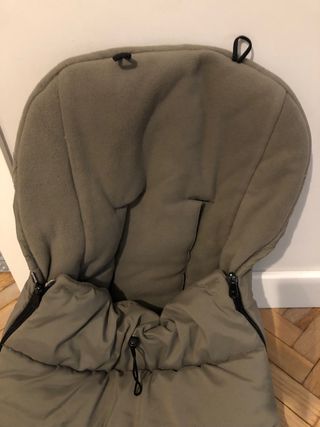 Saco silla bugaboo, color verde, en buen estado.
