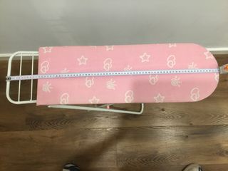 Plancha con tabla de planchar