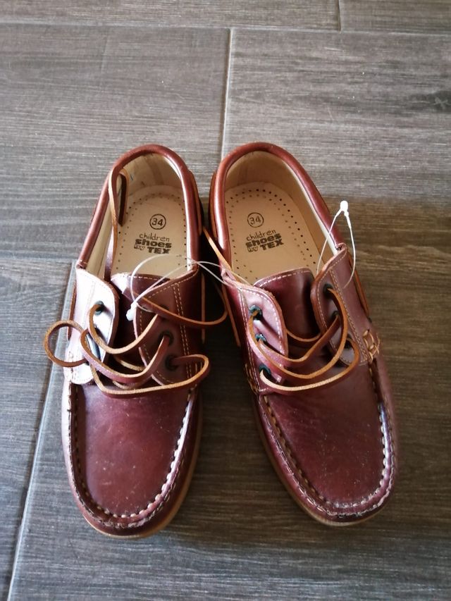 Náuticos infantiles nuevos de piel