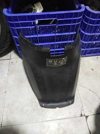 Cacha bajo asiento visión 110