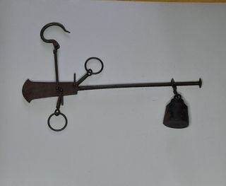 Antigua pesa romana.