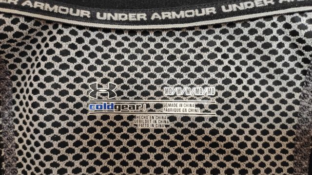 Camiseta sudadera cortavientos manga larga negra