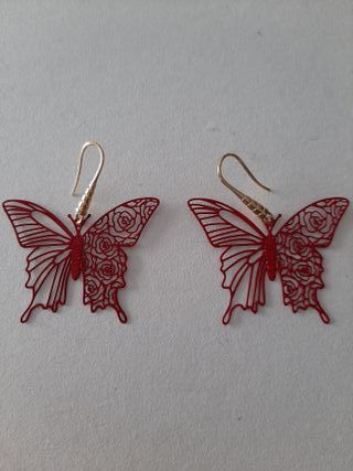 Pendientes de mariposas en metal de zinc rojo