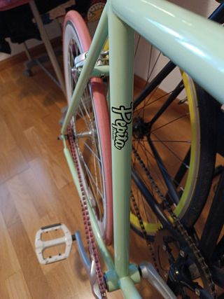 Bici fixie rosa y verde