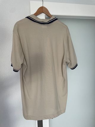 Polo Lacoste.