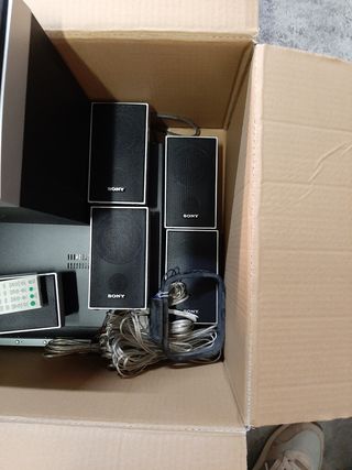 Reproductor DVD y sistema home cinema