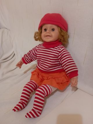 Muñeca antigua y canta perfectamente