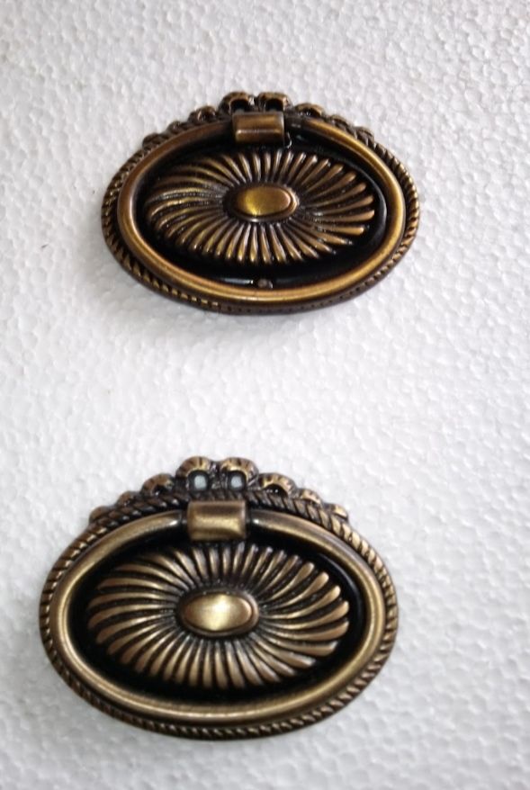 maniglie in bronzo lucido