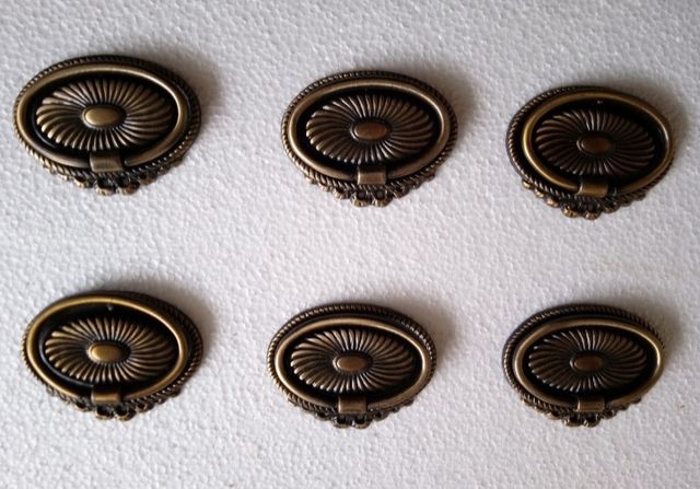 maniglie in bronzo lucido