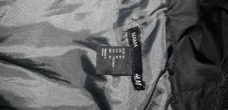 plumas H&M