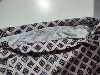 Pantalones acampanados con estampado geométrico