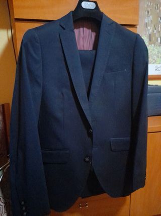þTraje de chaqueta joven