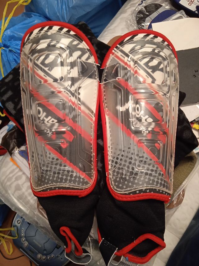 Espinilleras John Smith