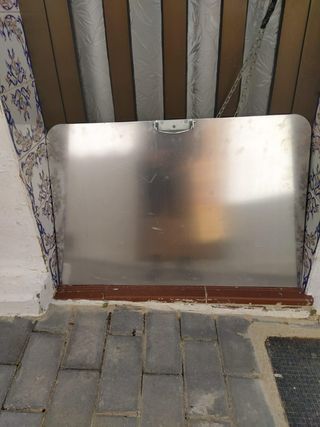 Plancha de protección para la puerta a medida