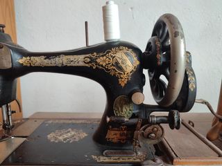 cambio maquina de coser manual antigua modista