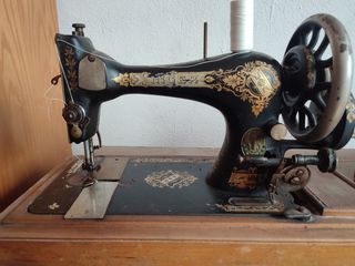 cambio maquina de coser manual antigua modista
