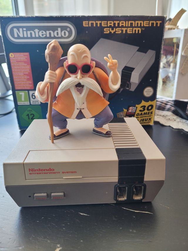 Nintendo mini original+dos mandos I un alargo.