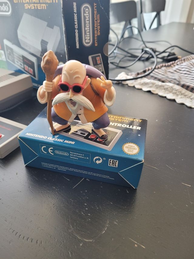 Nintendo mini original+dos mandos I un alargo.