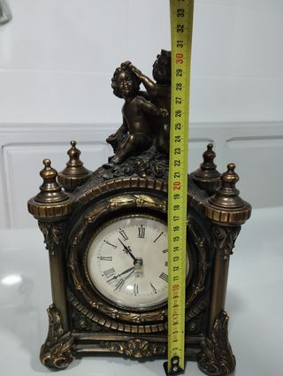 Reloj y candelabros