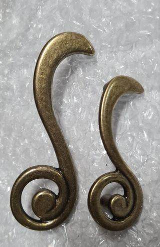 TIRADORES / POMOS / AGARRADORES ACERO DORADO