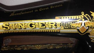 maquina de coser singer antigua