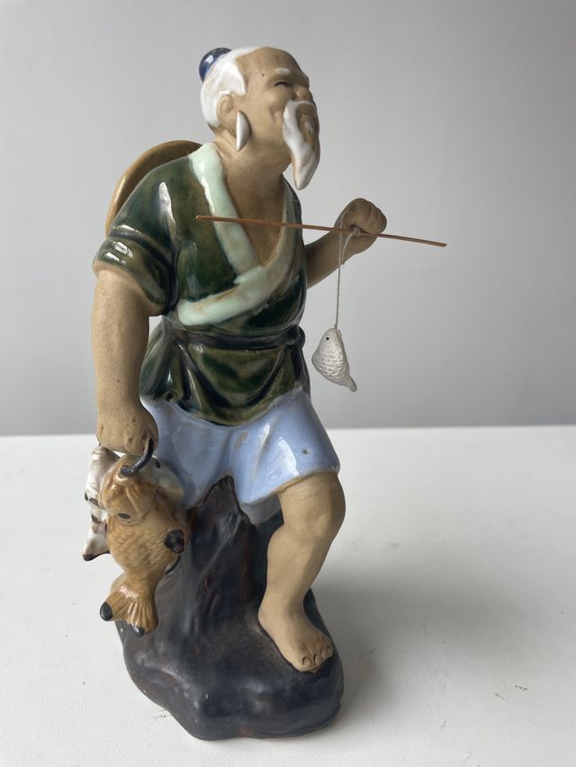 Figura pescador oriental